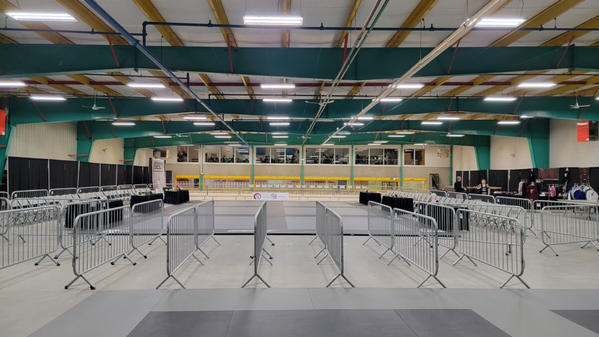 Barricade fences lined up for an indoor event