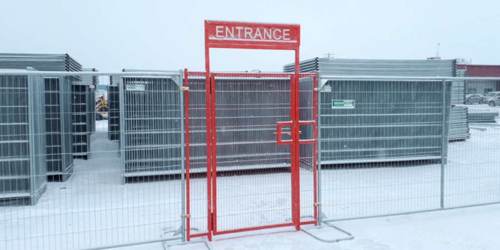 Construction site fence with pedestrian gate