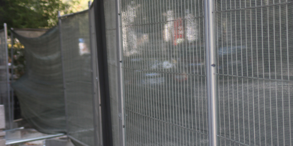privacy screen on temporary fence on a construction site